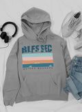 Gray hoodie with 'Blessed Beyond Measure' text, headphones, sneakers, and jeans on a white background