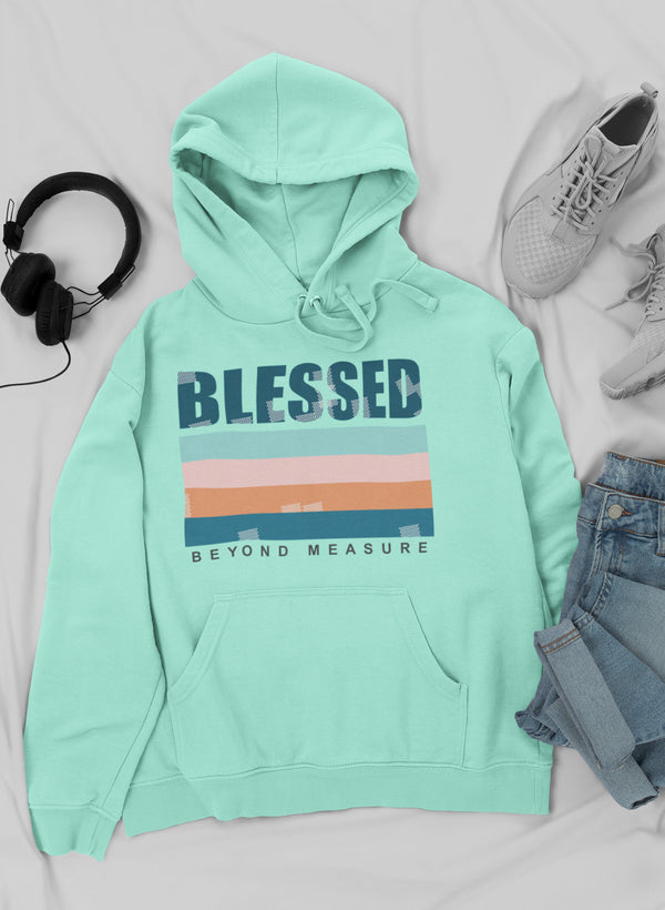 Mint green hoodie with 'Blessed Beyond Measure' text on a light gray background